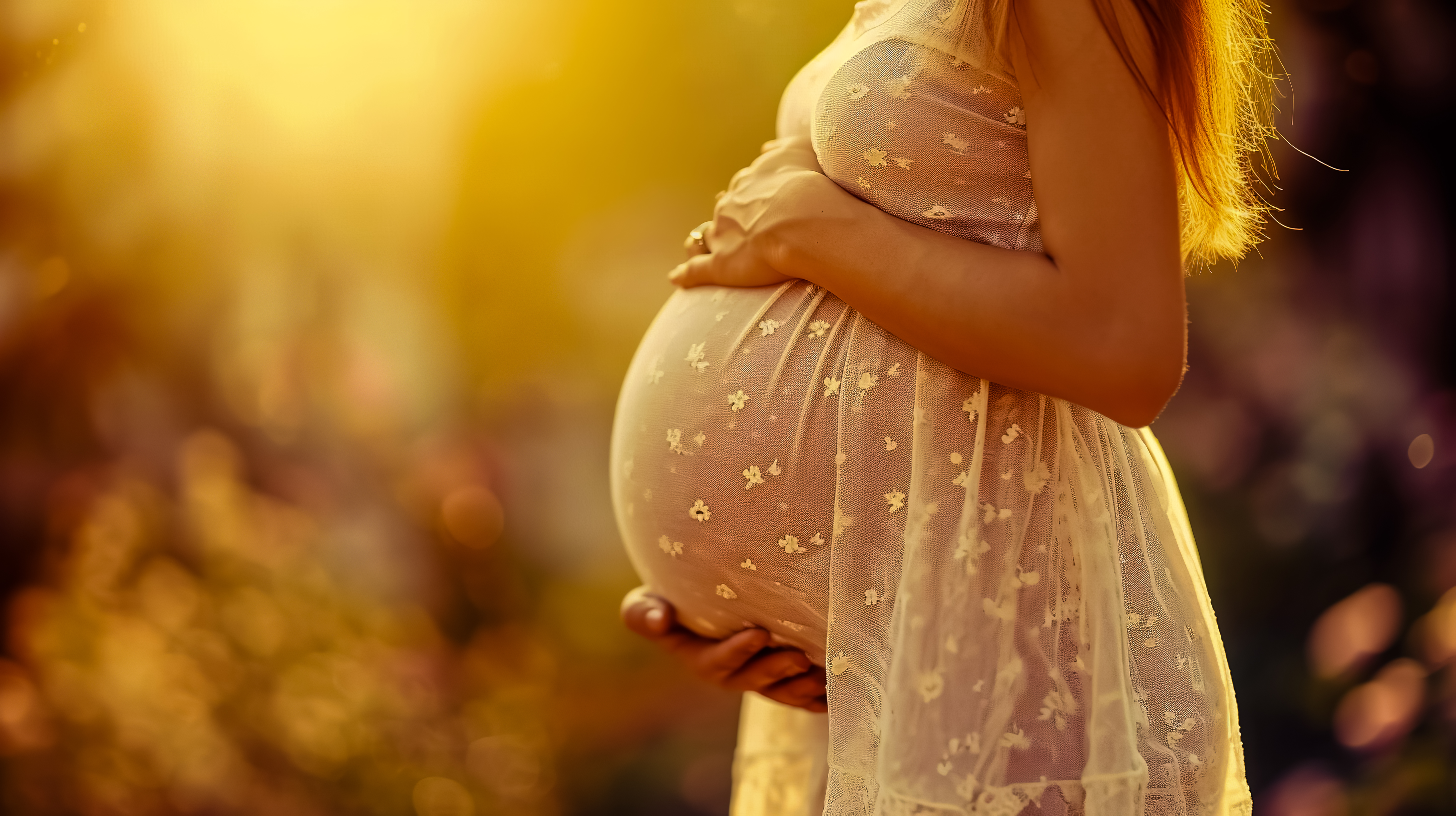 A pregnant woman holding her belly
